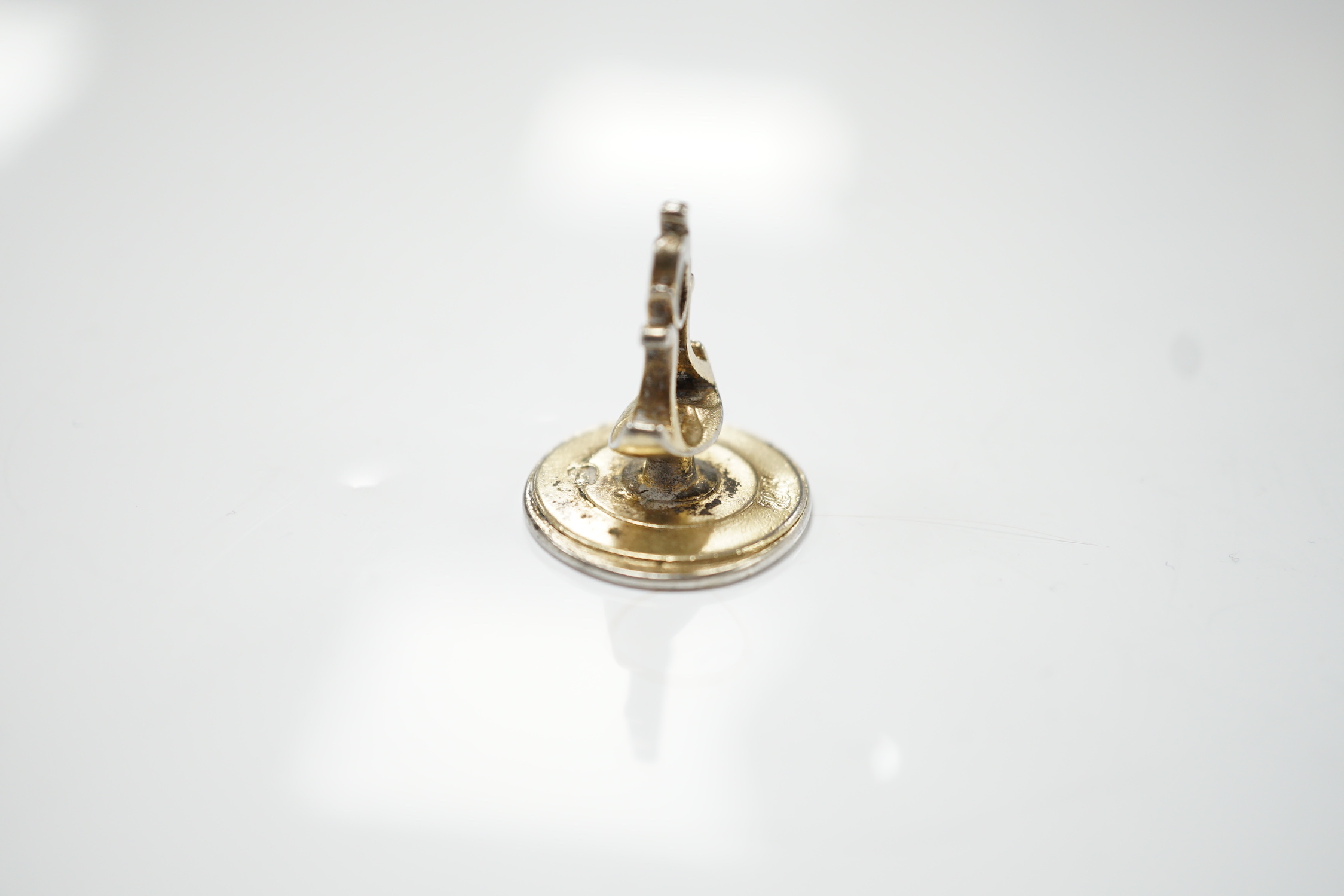 A George III parcel gilt silver fob seal, by Hester Bateman, London, circa 1770, 23mm, the matrix with crested monogram.
